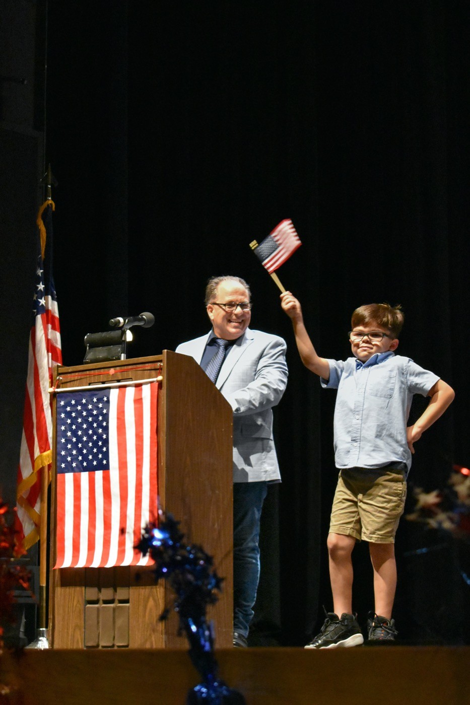 Student waving flag