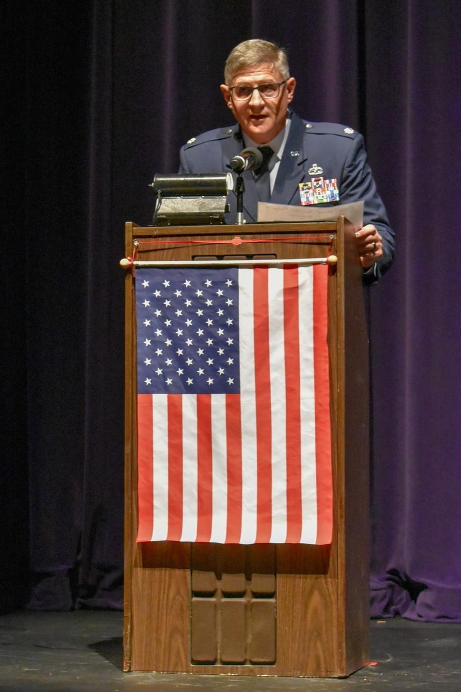 Military officer at podium